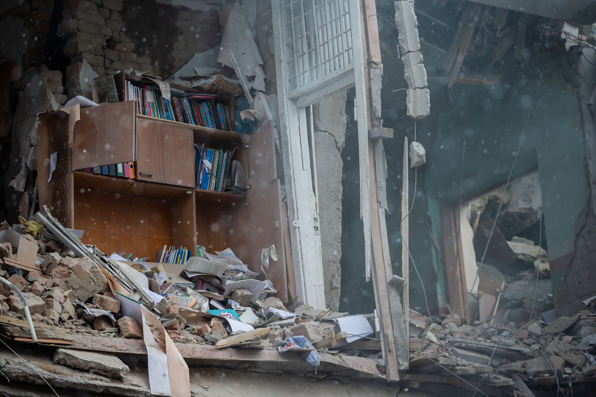 A classroom in the lyceum №25 in Zhytomyr. The school was fully destroyed as a result of the Russian missile strike. Photo by Vyacheslav Ratynskyy, Reporters. 5 March 2022. ~